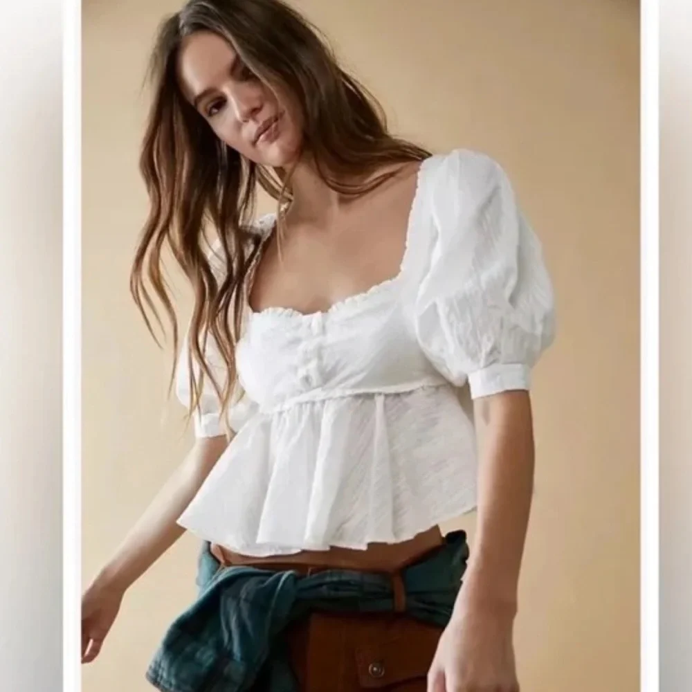 NWOT Free People Leave It To Me Burnt Orange Peplum Blouse
